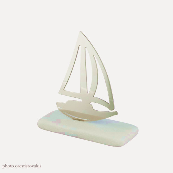 Decorative stainless steel boat in marble