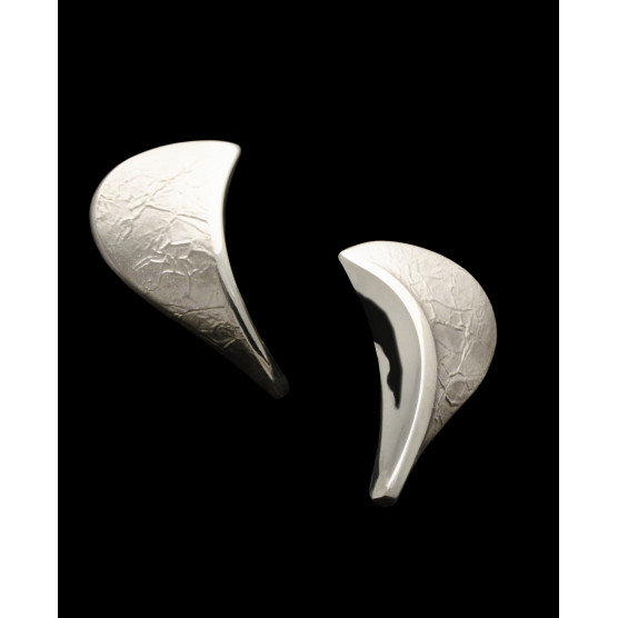 Silver earrings with white spotting